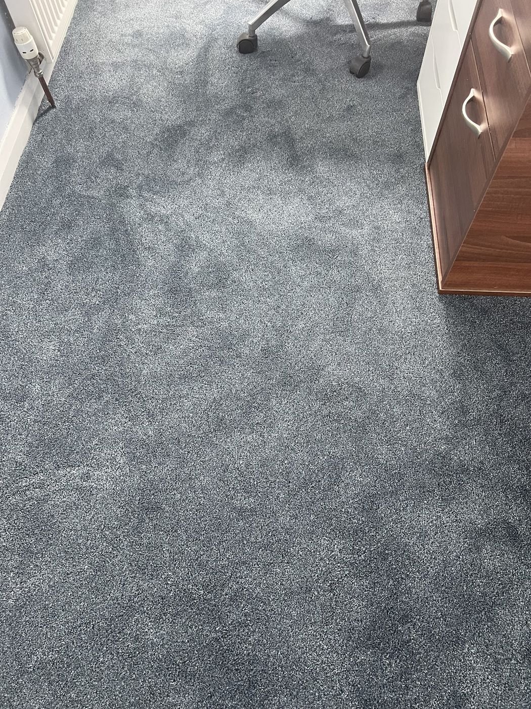 Blue-grey carpet in a home office